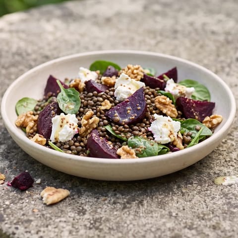 Beet, Lentil & Goat Cheese Salad - Earthy beets and Puy lentils with creamy goat cheese, walnuts and a mustardy dressing