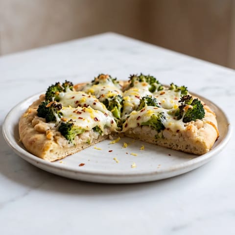 Broccoli & White Bean Melt Flatbreads - Garlicky smashed white beans and charred broccoli under bubbling mozzarella on flatbreads