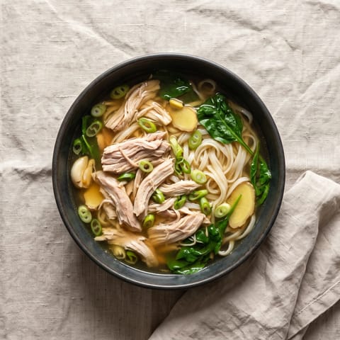 Chicken & Ginger Broth with Noodles - A restorative ginger-laced chicken broth