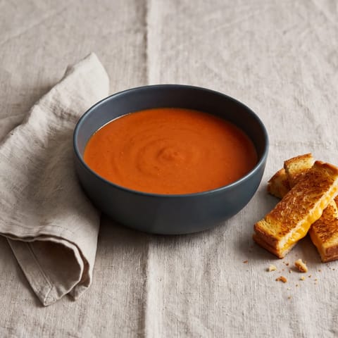 Creamy Tomato & Red Lentil Soup with Grilled Cheese Dippers - Velvety tomato soup thickened with red lentils, plus grilled-cheese dippers for dunking