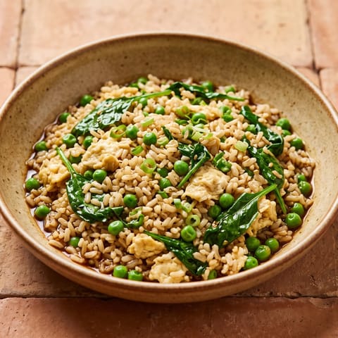 Egg-Fried Brown Rice with Peas & Greens - The leftovers rescue