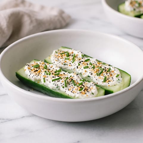 Everything Bagel Cream Cheese Cucumber Boats - Cucumber halves loaded with chive cream cheese and everything-bagel seeds