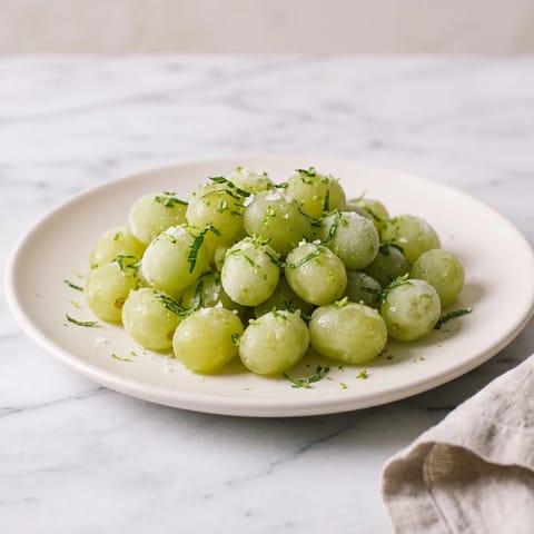 Frozen Grapes with Lime & Mint - Grapes frozen into tiny sorbet bombs with lime zest and mint
