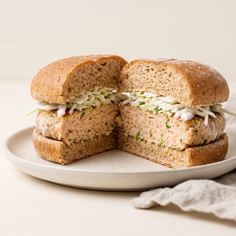 Ginger-Lime Salmon Burgers with Slaw - Hand-chopped salmon burgers bright with ginger and lime, in buns with a crunchy slaw
