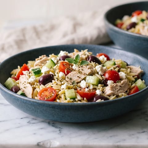 Greek Chicken Orzo Salad Boxes - Lemon-oregano chicken with orzo, cucumber, olives and feta