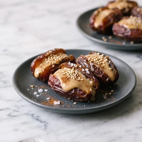 Medjool Dates with Tahini & Toasted Sesame - Soft dates split and filled with tahini, sealed with toasted sesame and sea salt