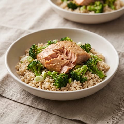 Miso Salmon & Sesame Broccoli Rice Bowl - Miso-glazed salmon over brown rice with sesame broccoli
