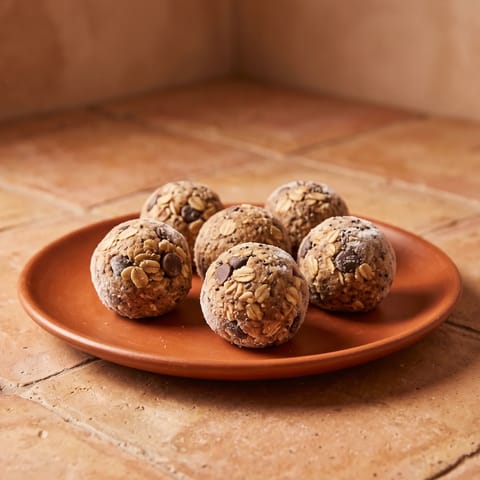 No-Bake Lactation Bliss Balls - Oat, flax and almond-butter energy balls with the full lactation-kitchen lineup