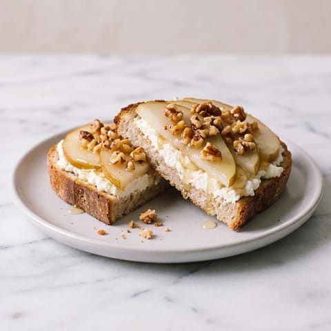 Pear, Ricotta & Honey Walnut Toasts - Small toasts of ricotta, ripe pear and honeyed walnuts