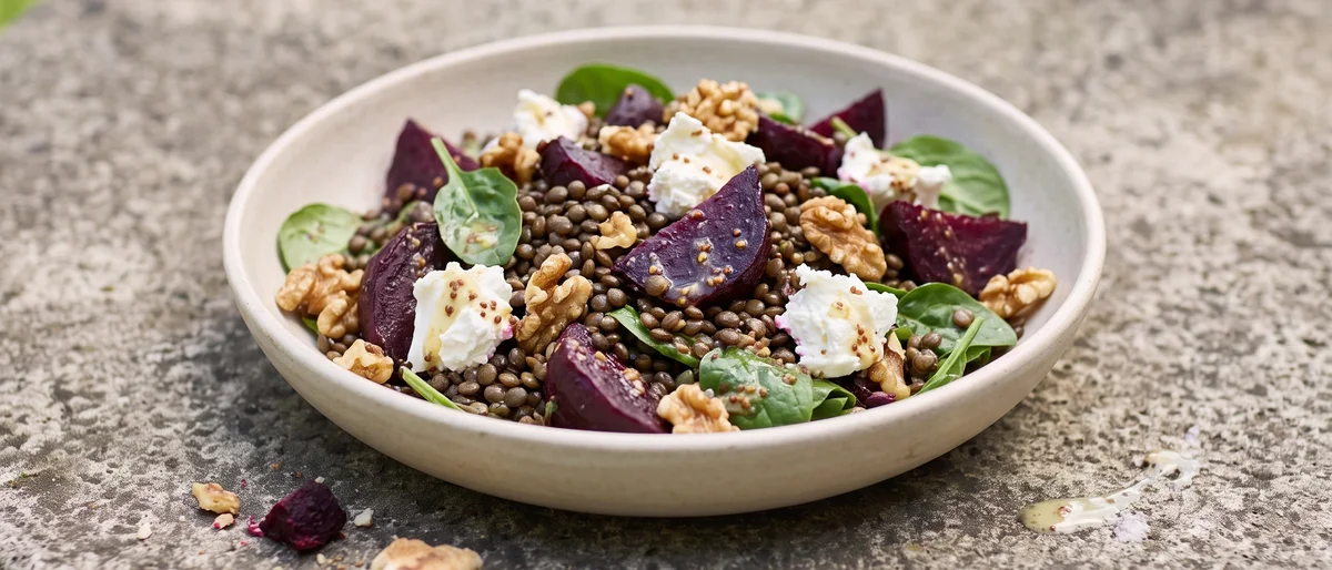 Beet, Lentil & Goat Cheese Salad - Earthy beets and Puy lentils with creamy goat cheese, walnuts and a mustardy dressing