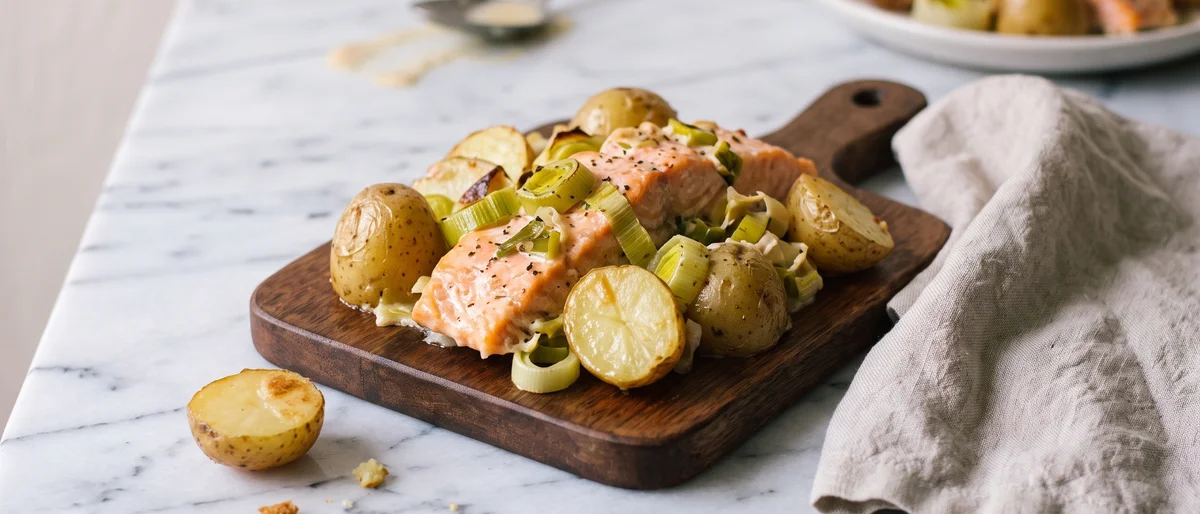 Creamy Salmon, Leek & Potato Sheet-pan Bake - Salmon roasted over creamy leeks and potatoes in one dish