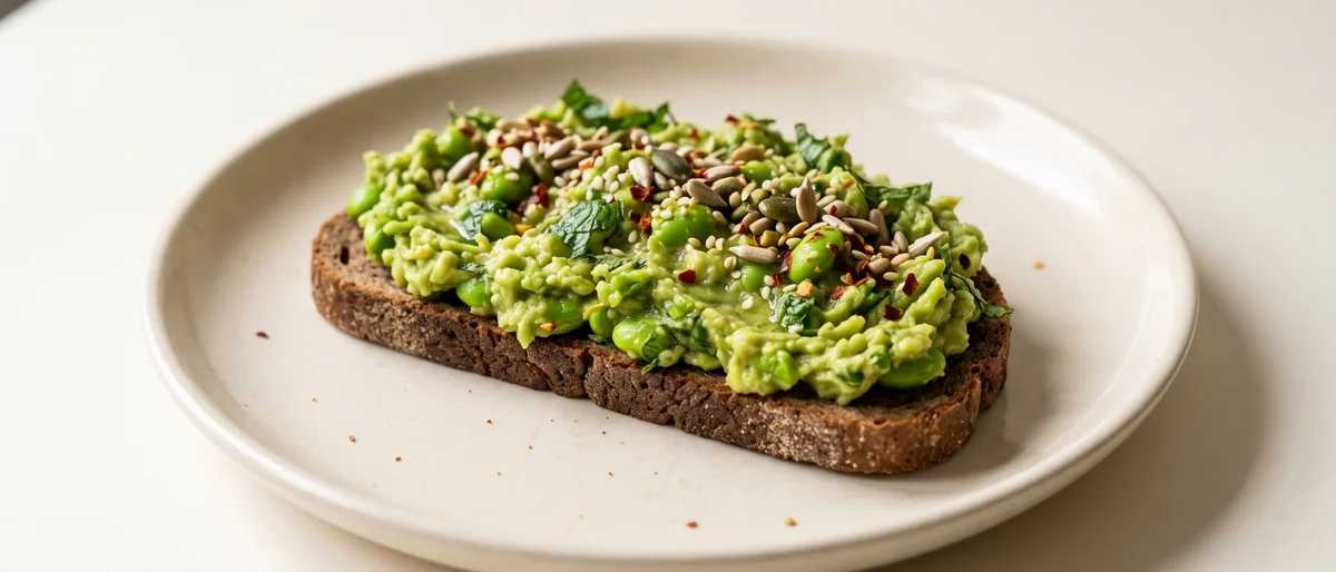 Edamame & Avocado Smash on Rye - Bright green edamame crushed with avocado, lemon and mint on dark rye