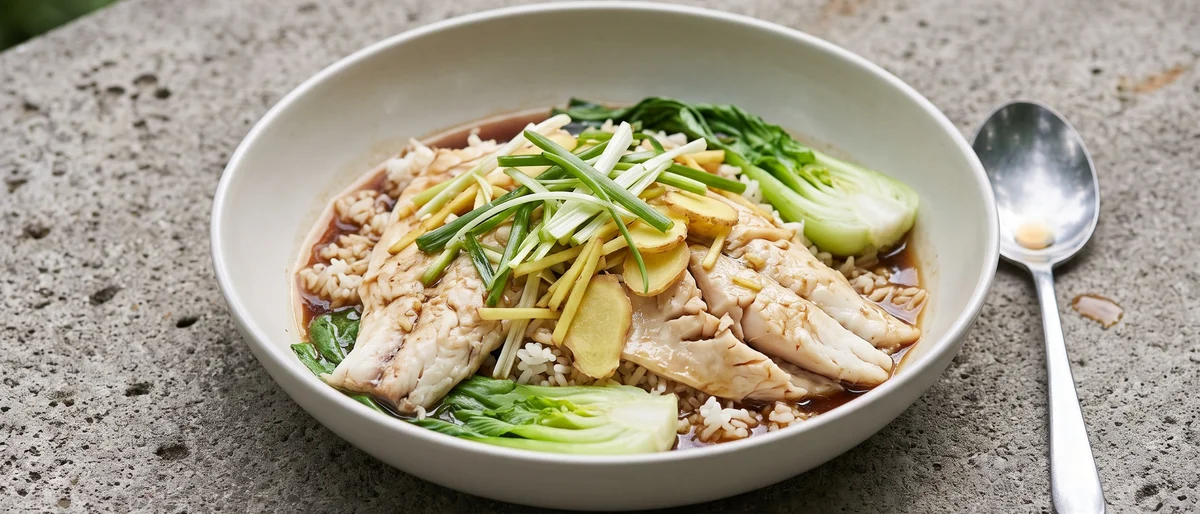 Ginger & Scallion Steamed Fish with Rice - Cantonese-style steamed sea bass or trout showered with hot ginger-scallion oil