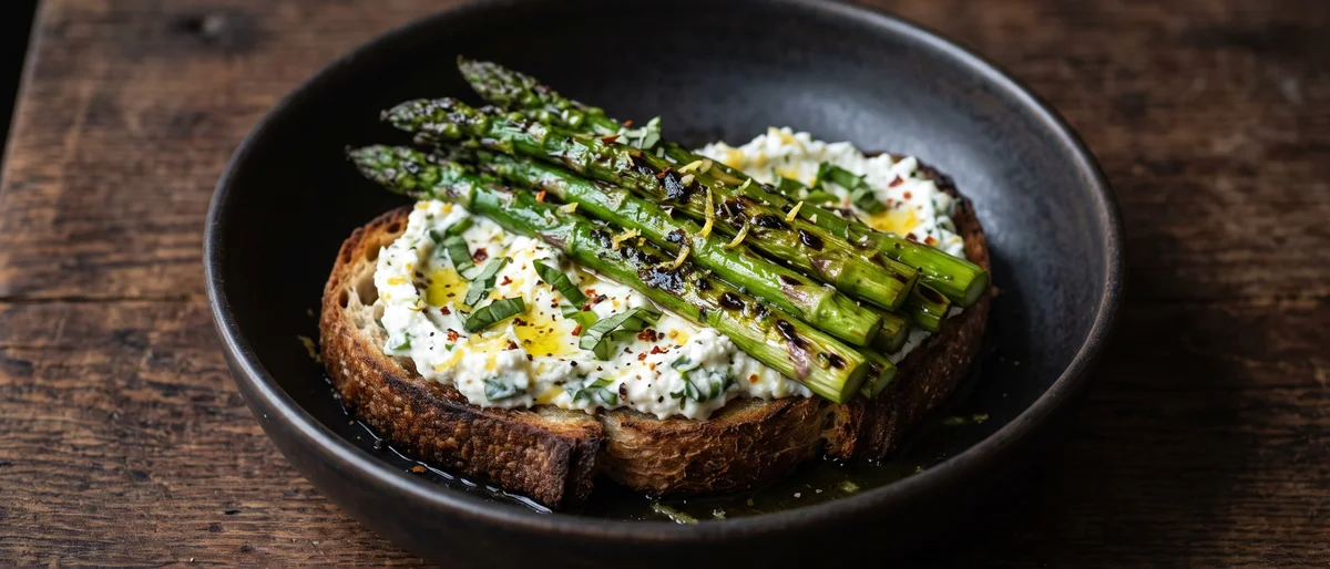Herbed Ricotta & Asparagus on Sourdough - Charred asparagus over lemony herbed ricotta on thick sourdough toast