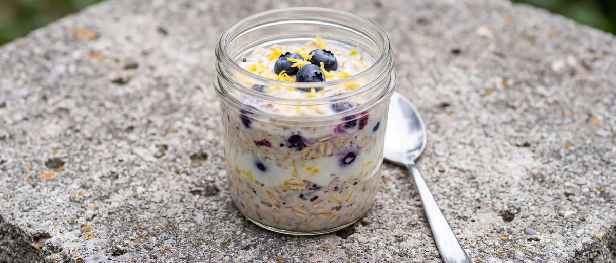 Lemon Blueberry Overnight Oat Jars - Bright lemon-zested overnight oats layered with smashed blueberries and yogurt