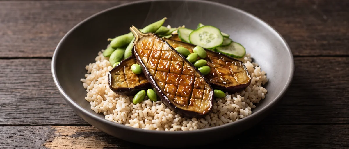 Miso Eggplant & Brown Rice Bowls - Roasted eggplant lacquered in miso-maple glaze over brown rice with edamame and quick-pickled cucumber