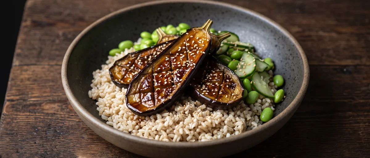 Miso Eggplant & Brown Rice Bowls - Roasted eggplant lacquered in miso-maple glaze over brown rice with edamame and quick-pickled cucumber