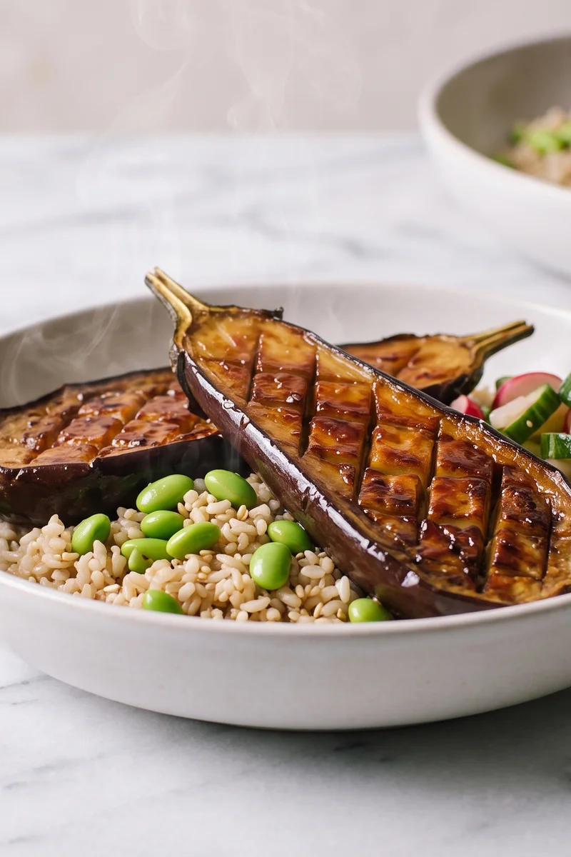 Miso-Glazed Eggplant with Sesame Rice & Edamame - Lacquered miso eggplant over sesame rice with edamame and quick pickles