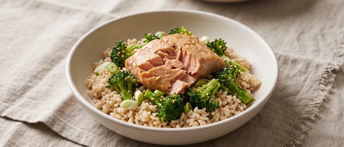 Miso Salmon & Sesame Broccoli Rice Bowl - Miso-glazed salmon over brown rice with sesame broccoli
