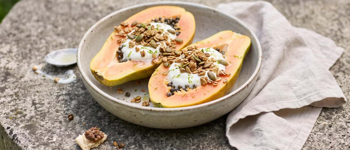 Papaya Boats with Lime, Yogurt & Granola - Ripe papaya halves filled with vanilla yogurt, granola and lime