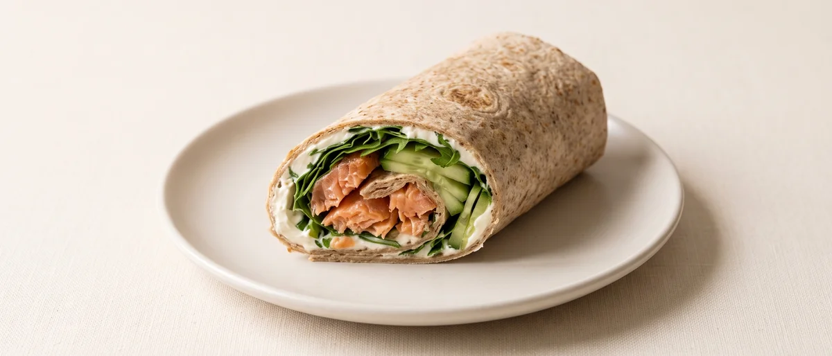 Salmon & Cream Cheese Breakfast Wrap - Hot-smoked salmon, cream cheese, cucumber and arugula rolled tight in a tortilla