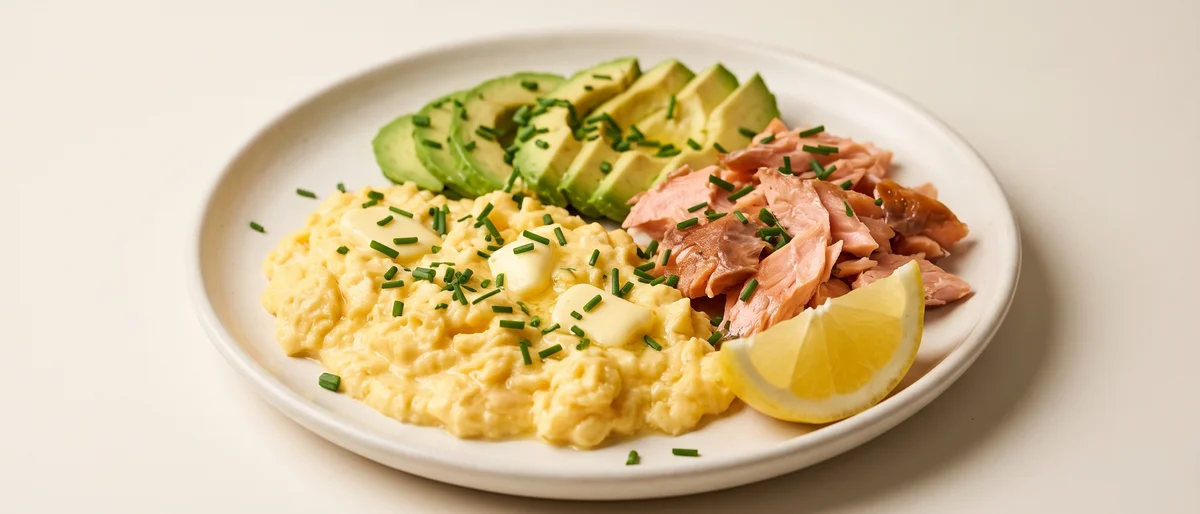 Salmon, Egg & Avocado Plate - Hot-smoked salmon, creamy scrambled eggs and sliced avocado on one plate