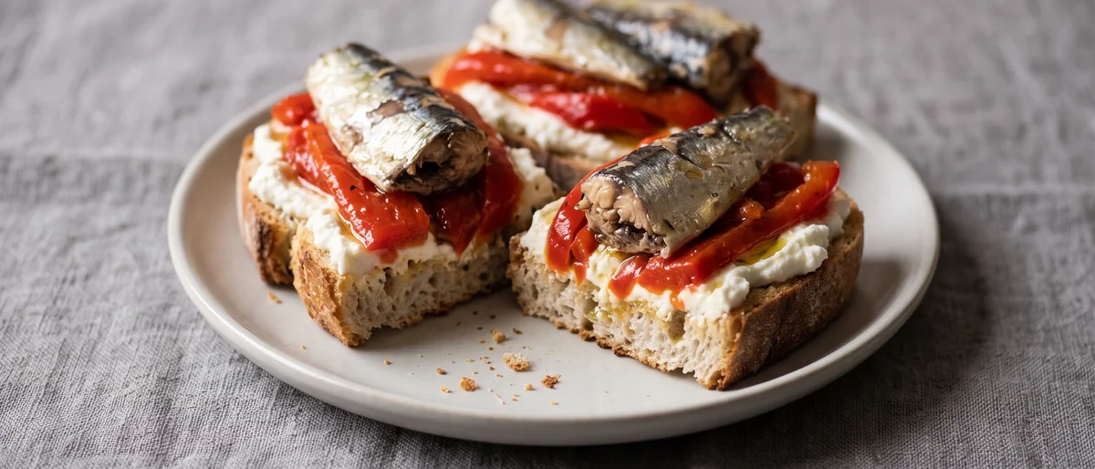 Sardine & Roasted Pepper Toasts with Whipped Feta - Whipped feta toast layered with jarred roasted peppers and sardines