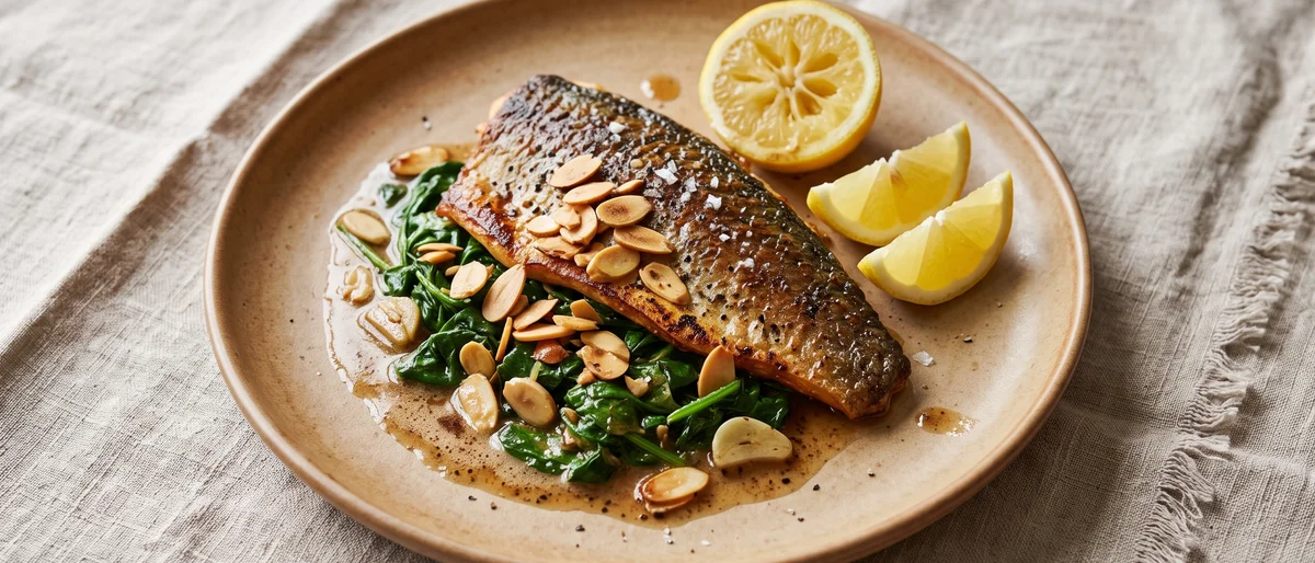Seared Trout with Brown Butter, Almonds & Greens - Crisp-skinned trout in nutty brown butter with almonds, lemon and wilted spinach