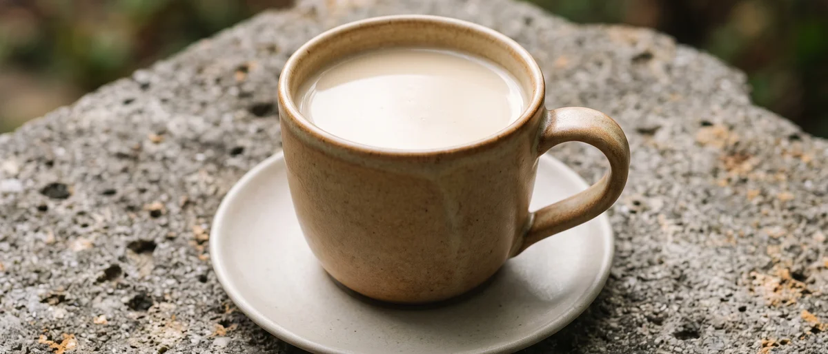 Spiced Chai-Style Warm Milk with Honey - Warm milk steeped with cinnamon, cardamom and ginger, finished with honey